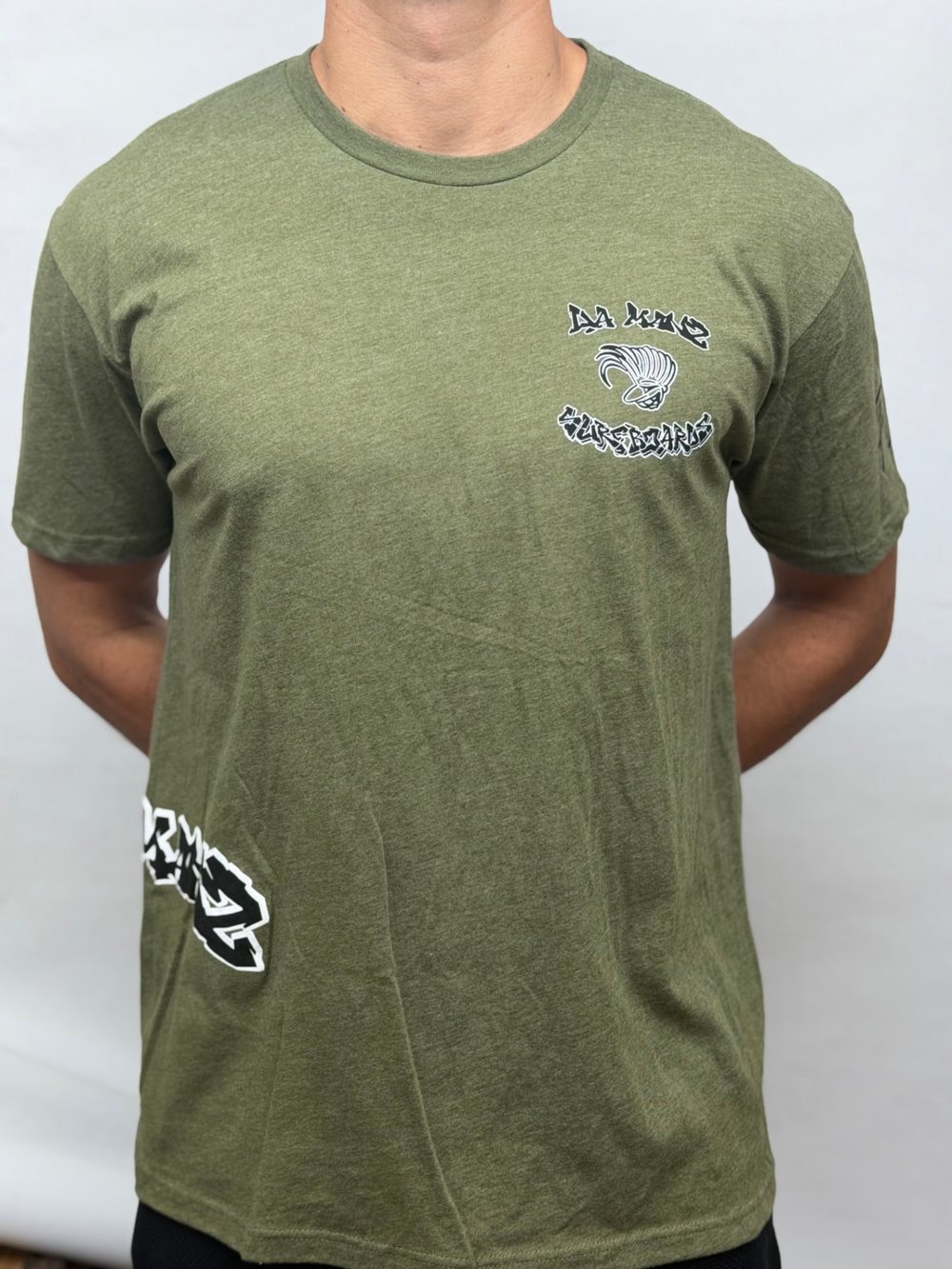 Da Manz Surfboards Tee in Heather Olive, front view